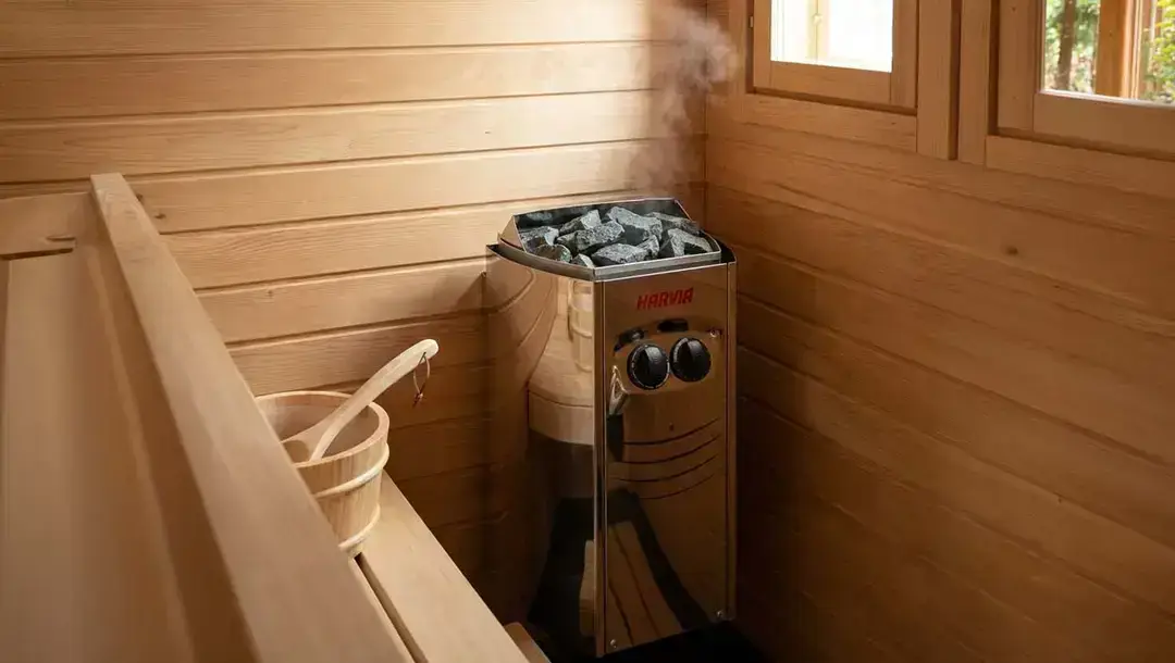 Wood sauna with steaming heater